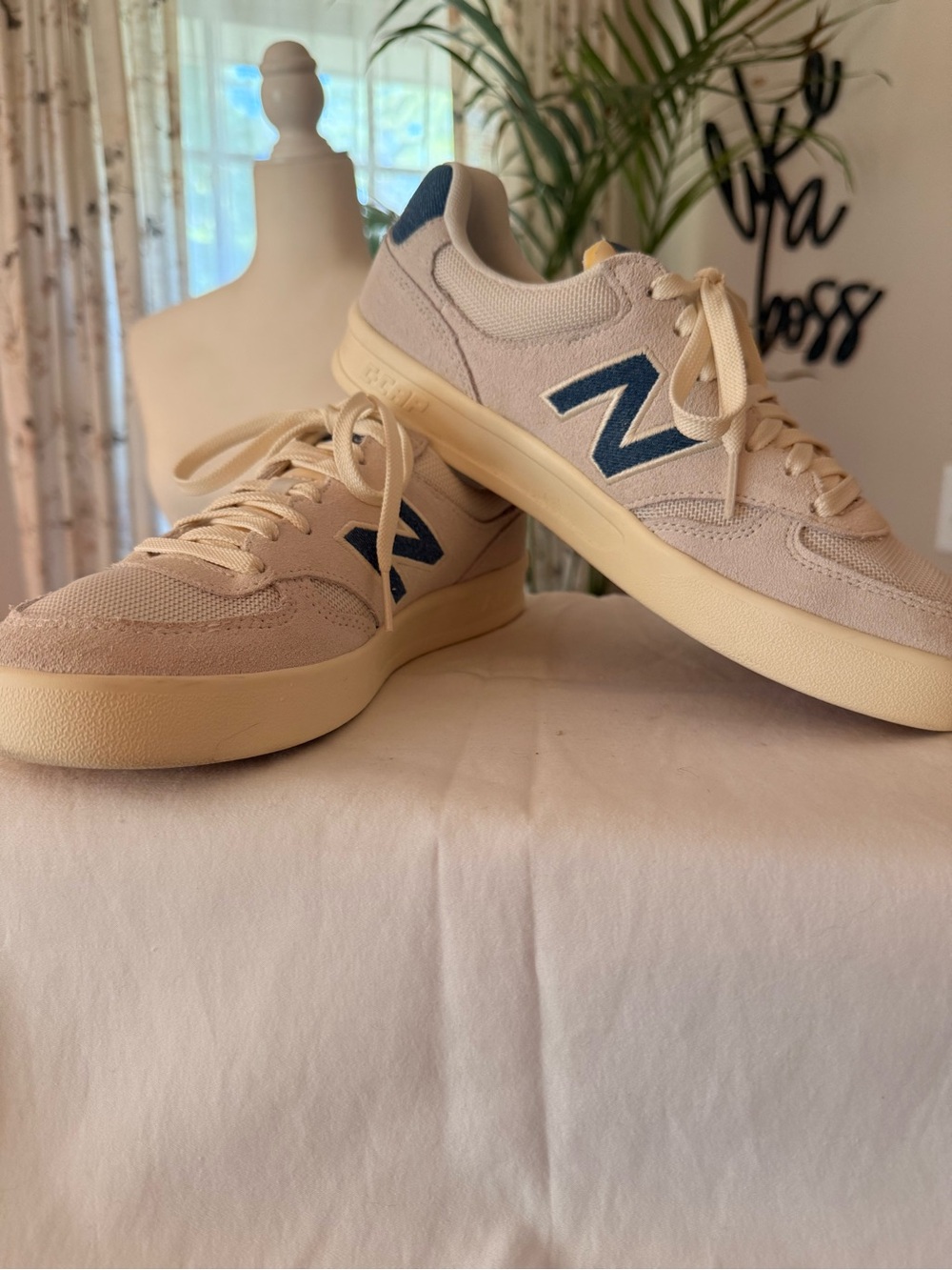 New Balance Women’s Cream Suede Sneakers with Blue 'N' Accent